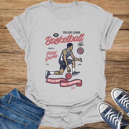 White t-shirt with basketball player graphic and text.