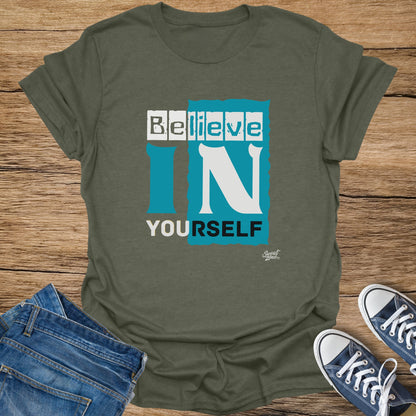 Olive green t-shirt with the words "BELIEVE IN YOURSELF" in white and teal text.