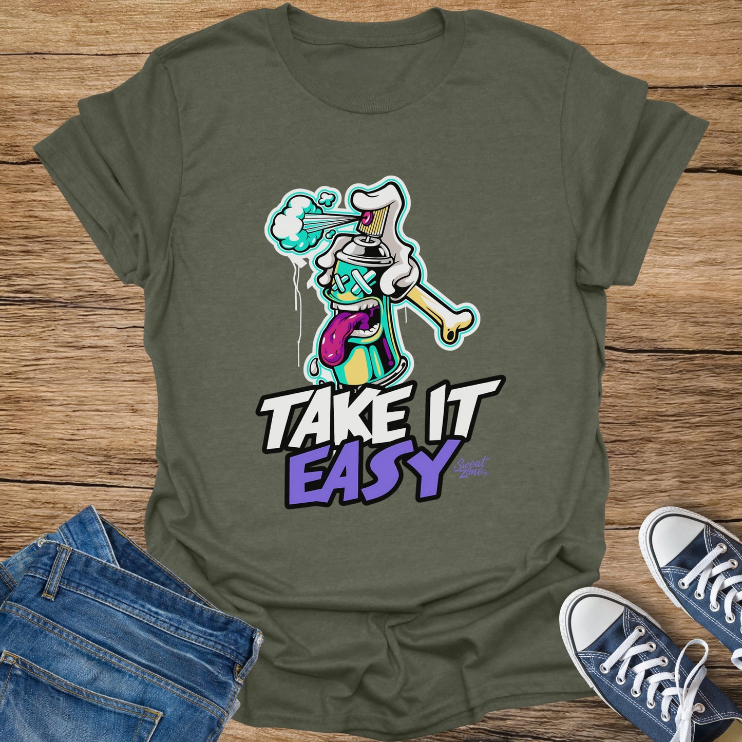 Olive green t-shirt with graffiti spray can artwork and text "TAKE IT EASY".