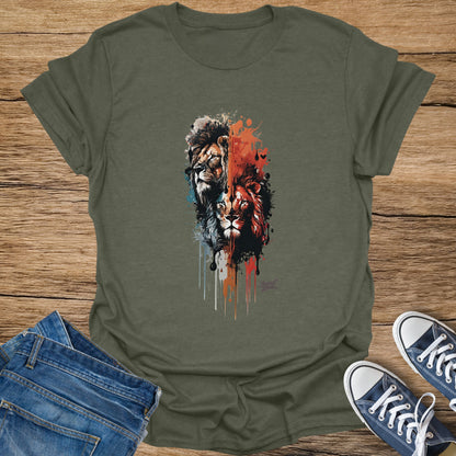 Olive green t-shirt with a watercolor design of two lion heads and dripping paint.