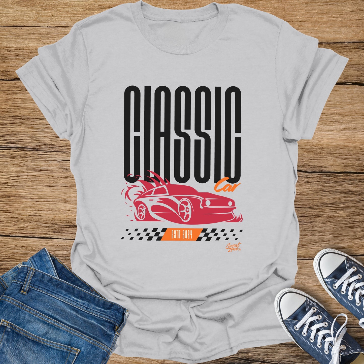 White t-shirt with "CLASSIC Car" text and a red stylized car graphic, "ESTD 2024".