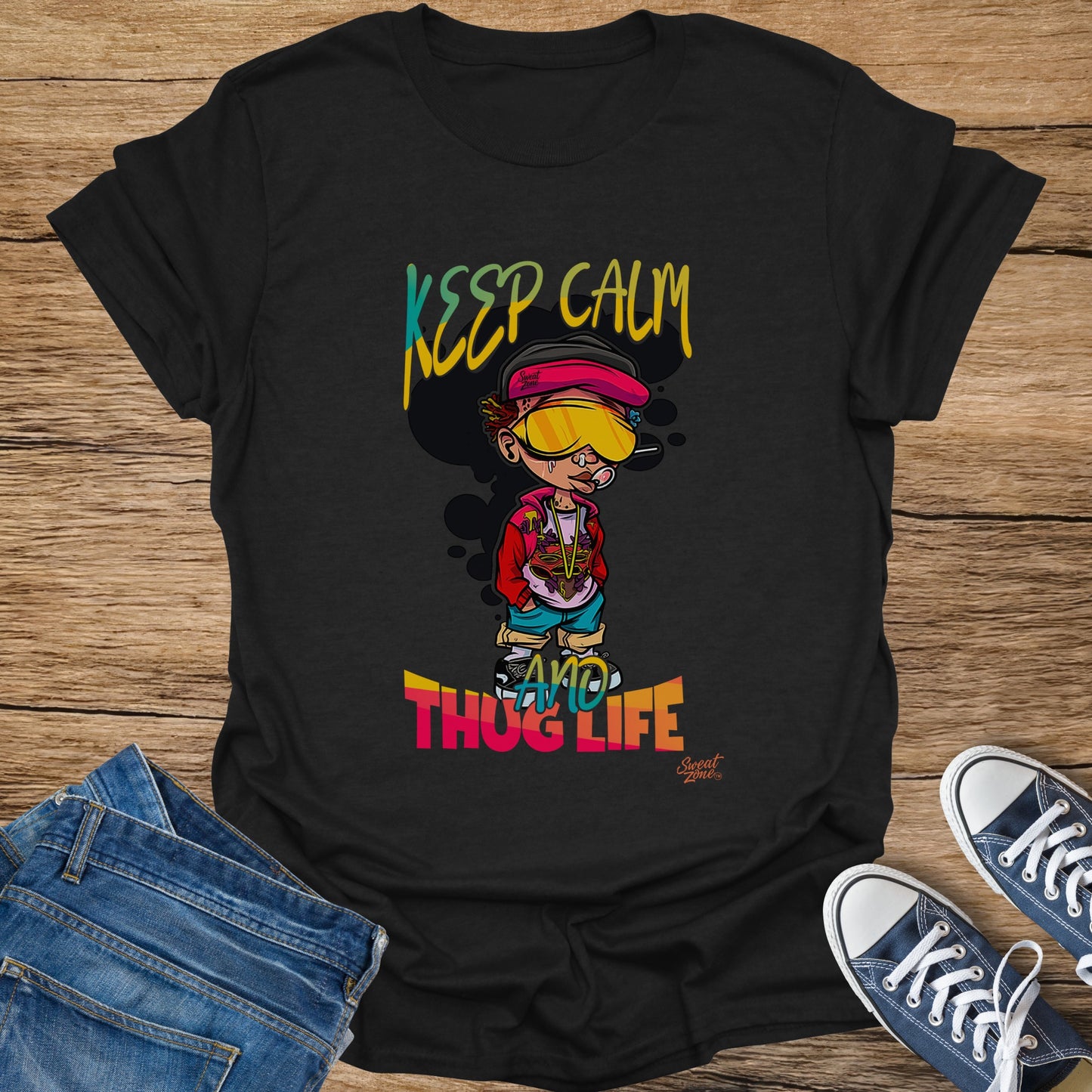 Black t-shirt with cartoon of character wearing sunglasses and cap, text "KEEP CALM AND THUG LIFE".