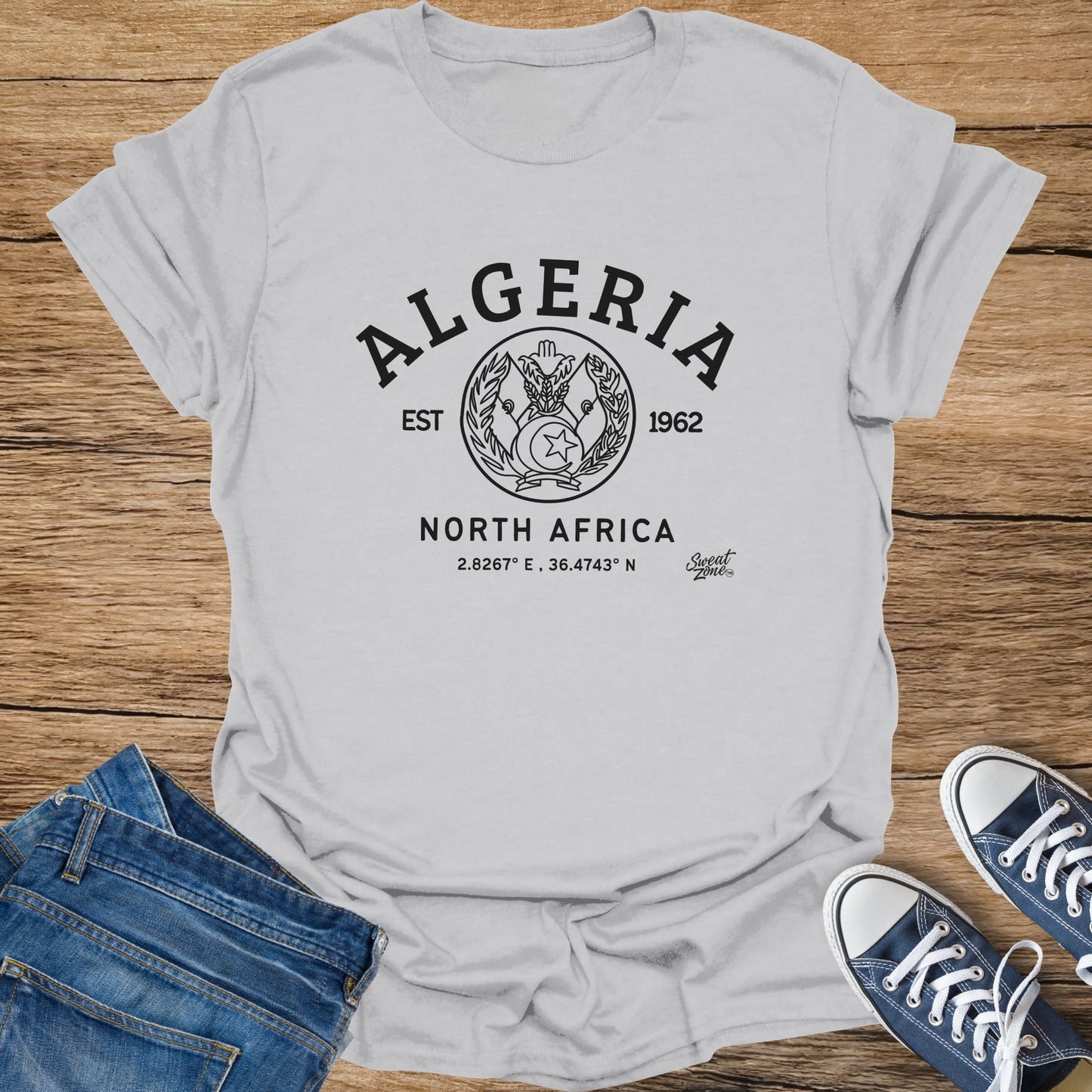Light gray t-shirt with black text and emblem for Algeria, North Africa.