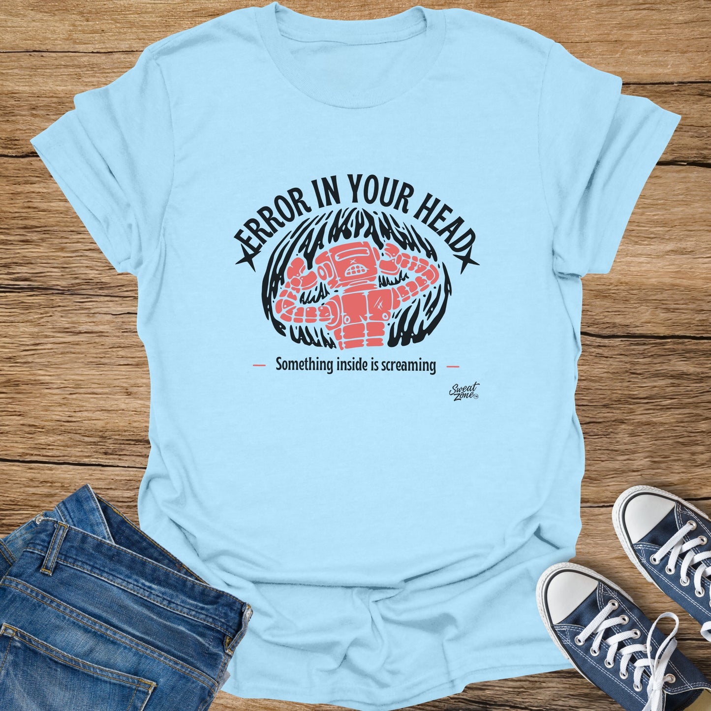 Light blue t-shirt with graphic "Error in your head" and distressed robot.