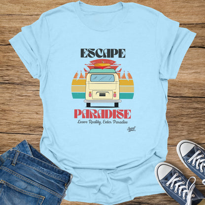 Light blue t-shirt with vintage van, surfboards, and "Escape Paradise" graphic.