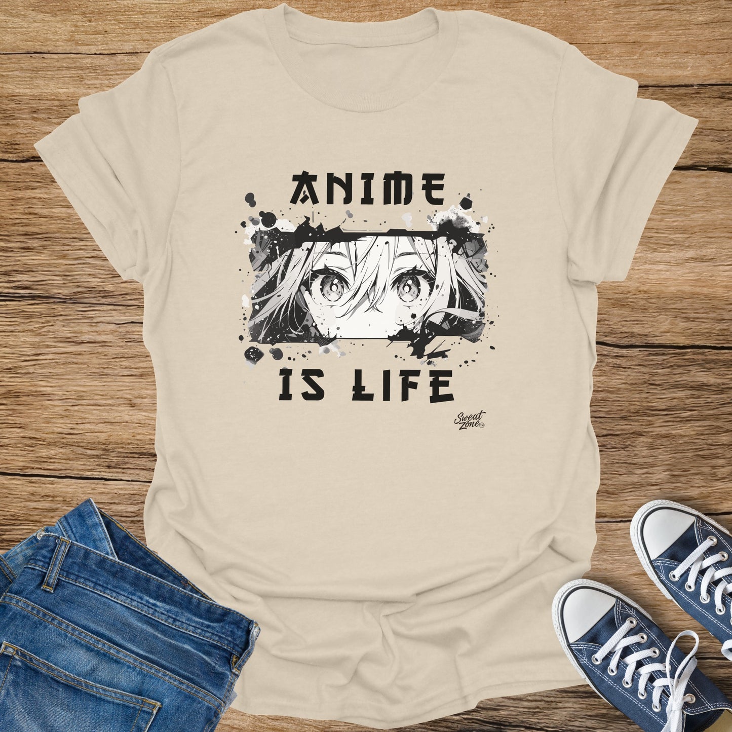 Cream t-shirt with black anime eyes graphic and text "ANIME IS LIFE."