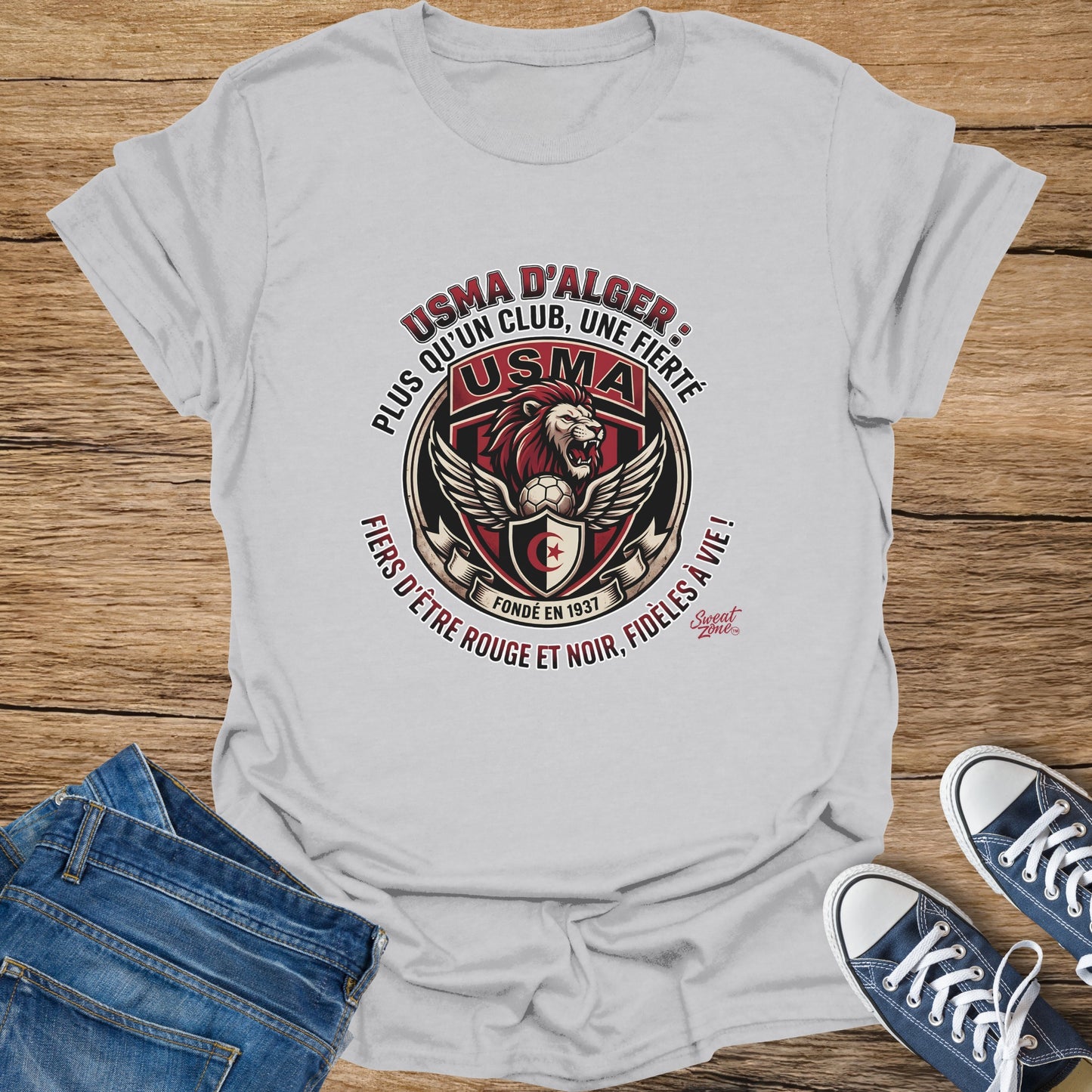 USMA D'Alger t-shirt with lion, soccer ball, and Arabic text.