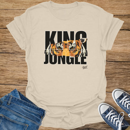 Cream t-shirt with "KING JUNGLE" text and tiger eyes graphic.