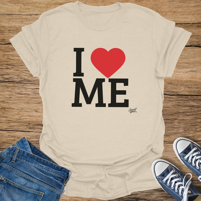 T-shirt with large black text "I" and "ME" and a red heart in the middle.