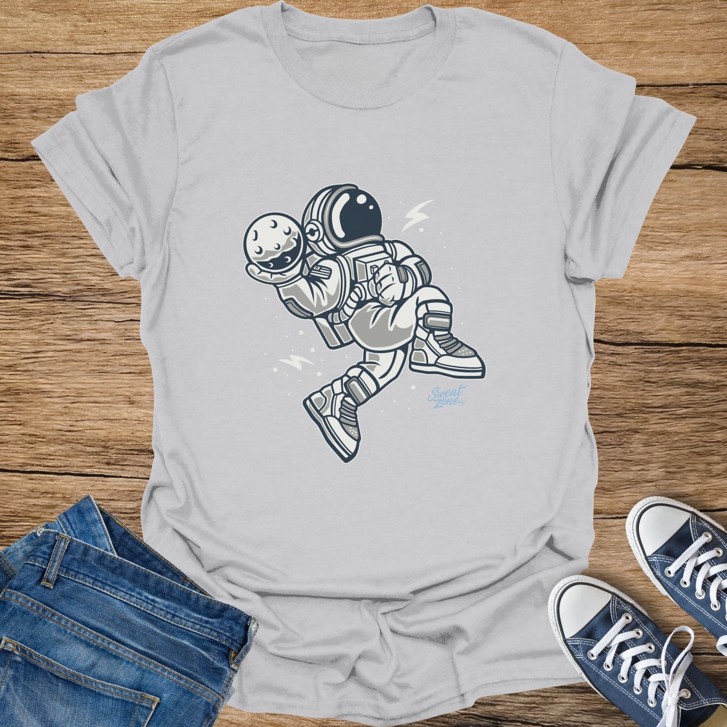 Astronaut holding a moon with "Sweet Zone" logo.