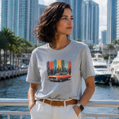 T-shirt with vintage car and city skyline graphic on colorful vertical stripes.