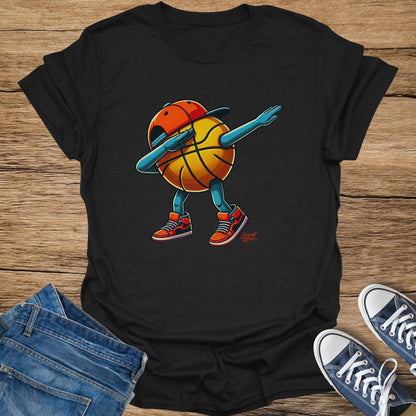 Black t-shirt with cartoon basketball dabbing in sneakers and cap.