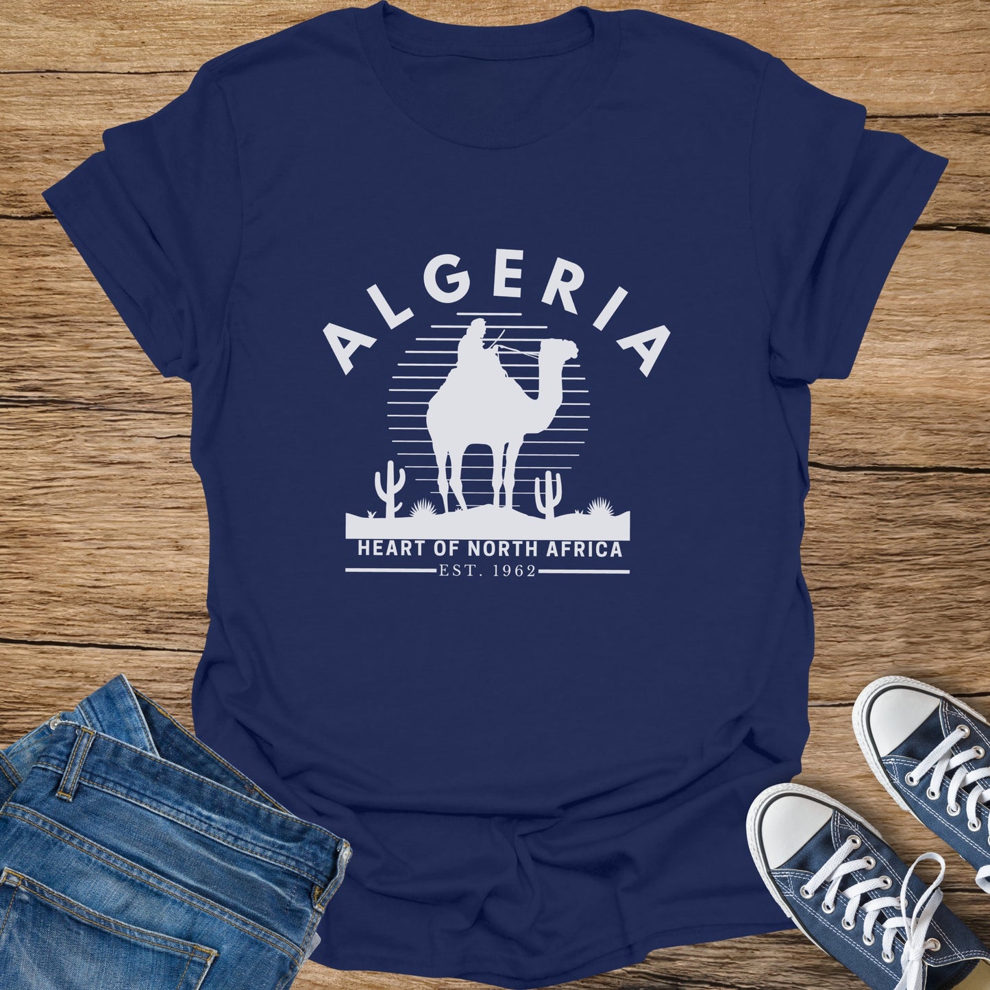 Navy t-shirt with camel silhouette and "Algeria Heart of North Africa Est. 1962" text.