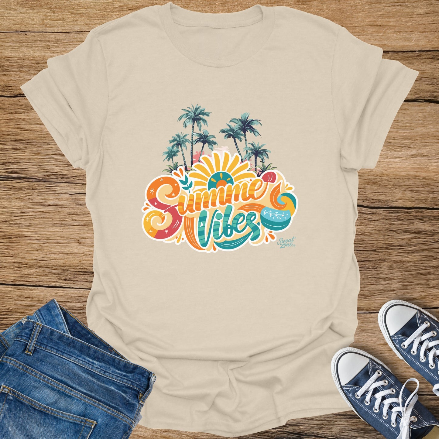 Cream t-shirt with colorful "Summer Vibes" graphic and palm trees.