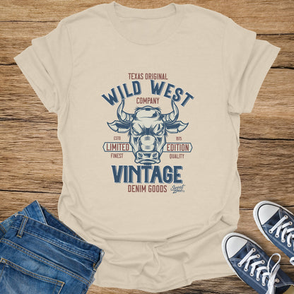 Cream t-shirt with vintage "Wild West Company" bull skull graphic and text.