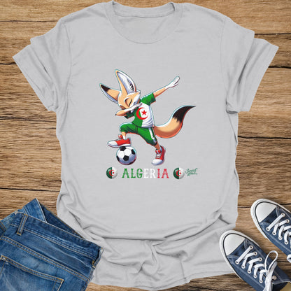 Fennec fox mascot in soccer uniform dribbling a ball, with "Algeria" text.