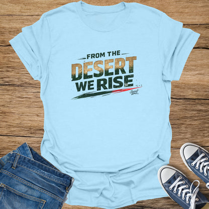 Light blue t-shirt with "From the Desert We Rise" text and distressed flag design.