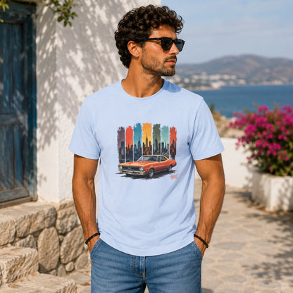 Light blue t-shirt with orange classic car and city skyline graphic.