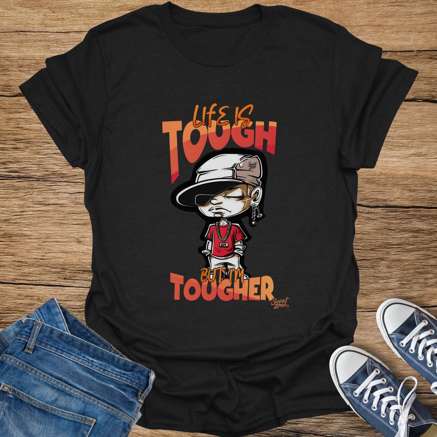 Black t-shirt with "Life is Tough, But I'm Tougher" graphic.