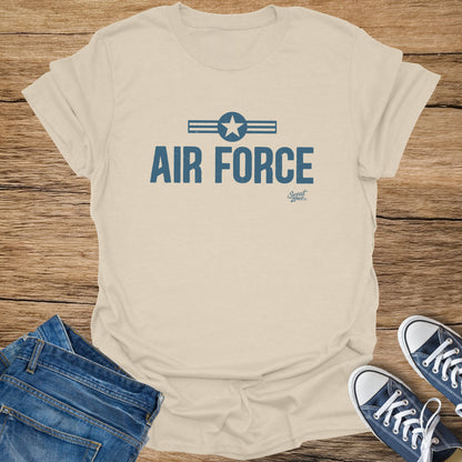 Light brown t-shirt with distressed blue "AIR FORCE" text and logo.