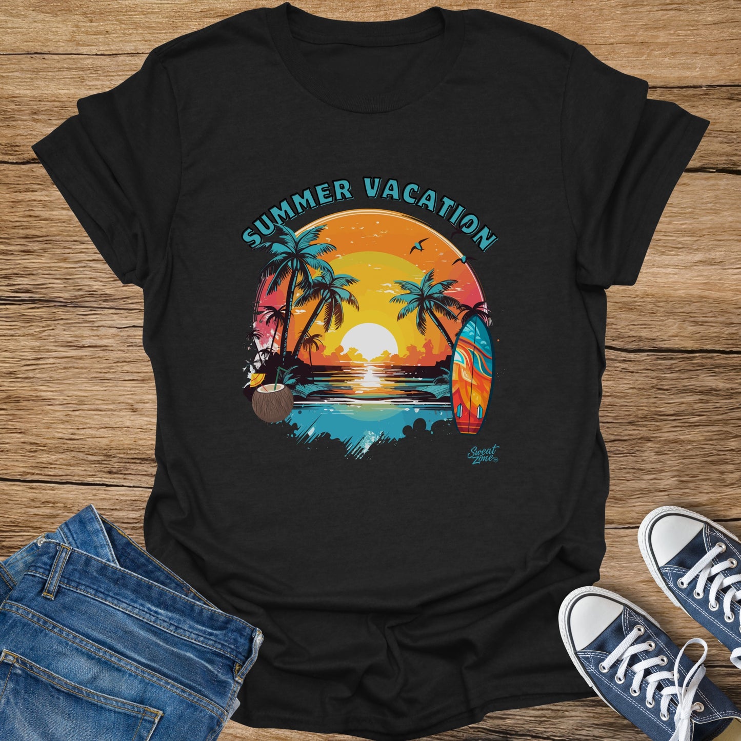Black t-shirt with "Summer Vacation" text over a tropical sunset with palm trees and a surfboard.