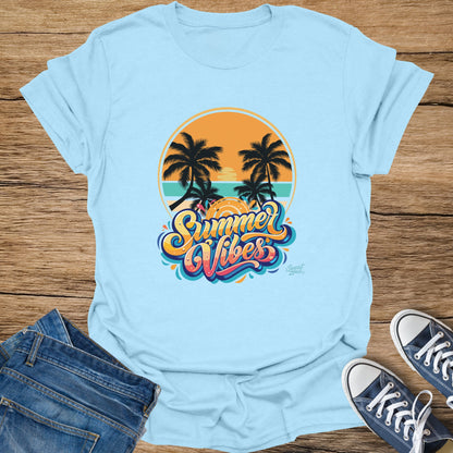 Light blue t-shirt with "Summer Vibes" text and tropical palm trees sunset graphic.