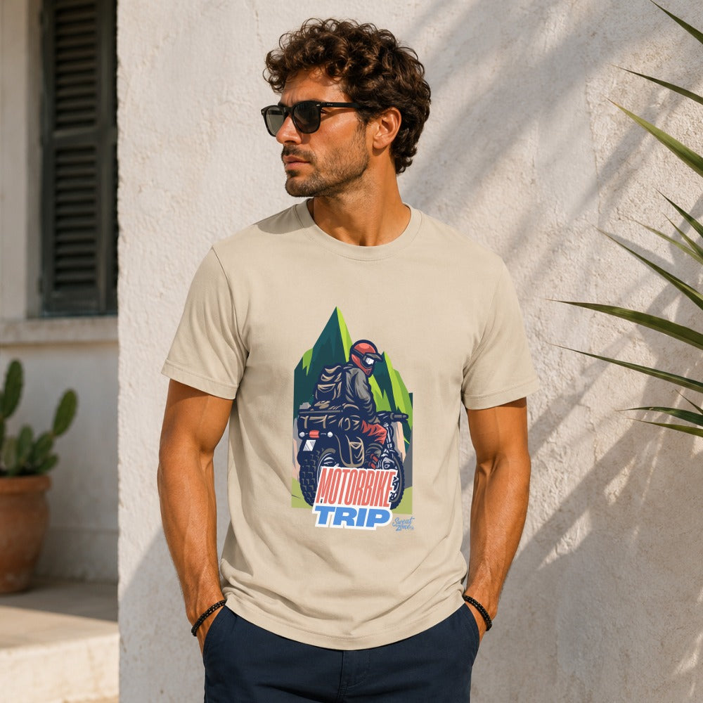 T-shirt graphic with "Motorbike Trip" text and a rider on a motorcycle in mountains.