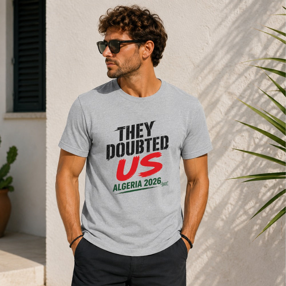 Grey t-shirt with "They Doubted US ALGERIA 2026" text.