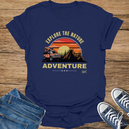 Navy t-shirt with graphic of orange camper and "Explore the Nature Adventure" text.