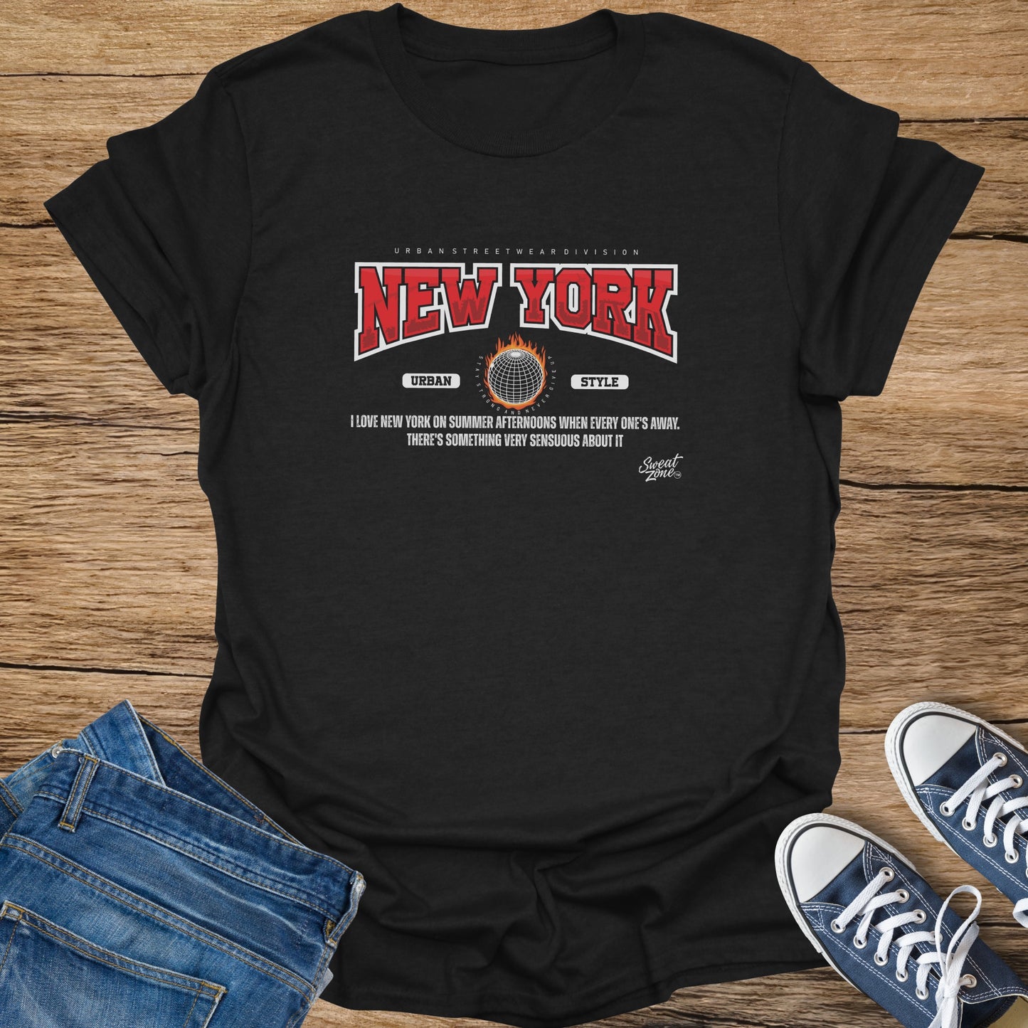 Black t-shirt with "New York" graphic, globe, and descriptive text.