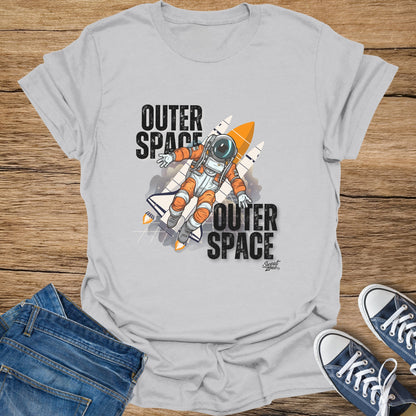 Light gray t-shirt with astronaut and rockets graphic, bold "Outer Space" text.
