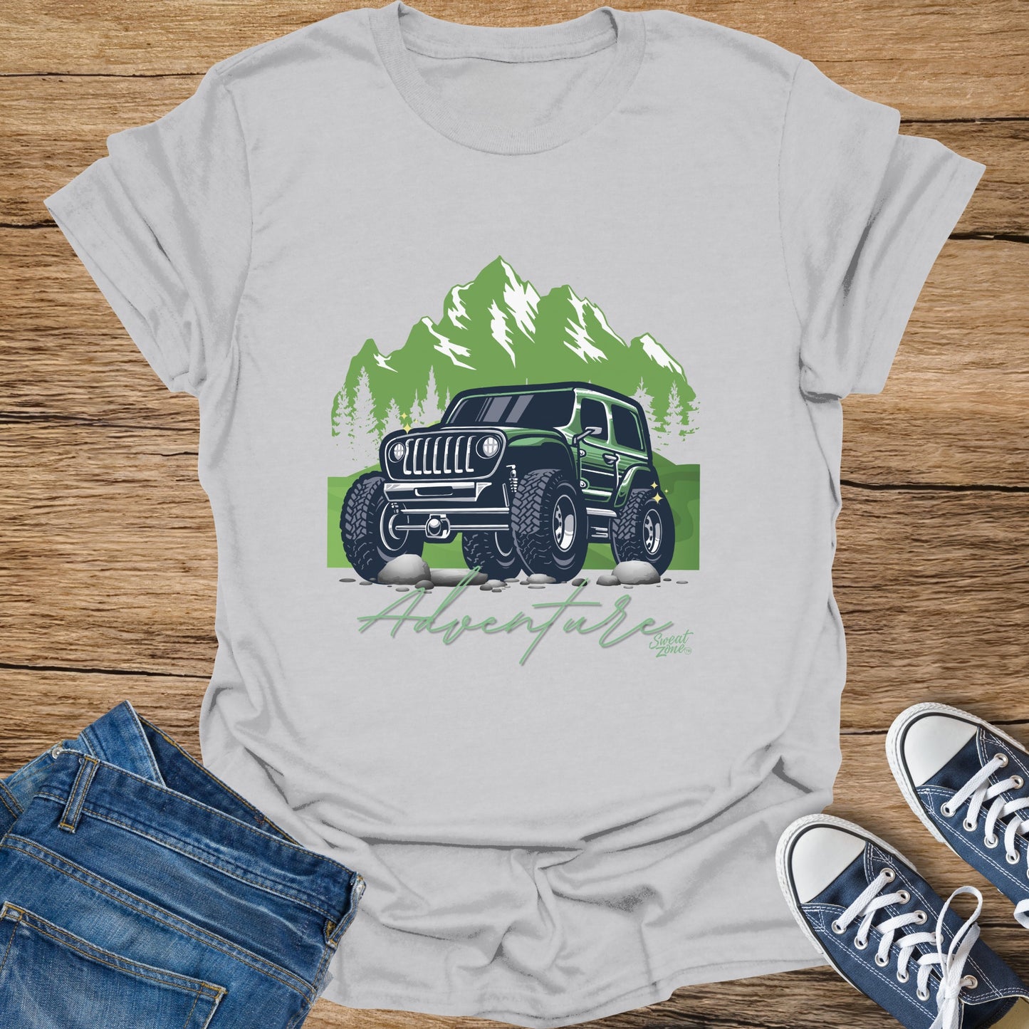 Green off-road vehicle graphic with mountains and "Adventure" text.