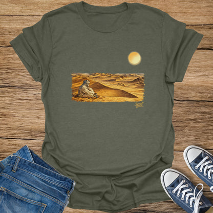 T-shirt with illustration of person in desert with sun and "Sweat Zone" logo.