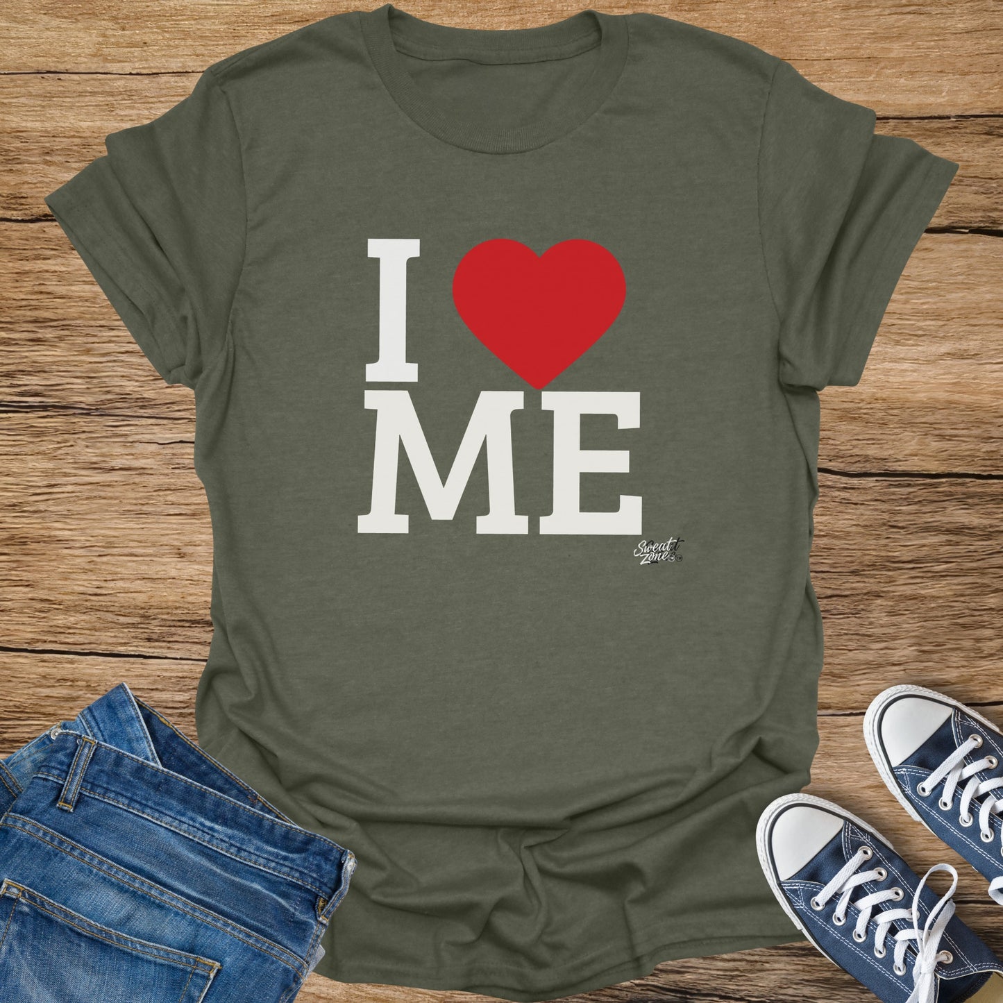 Green t-shirt with "I HEART ME" text and red heart logo.