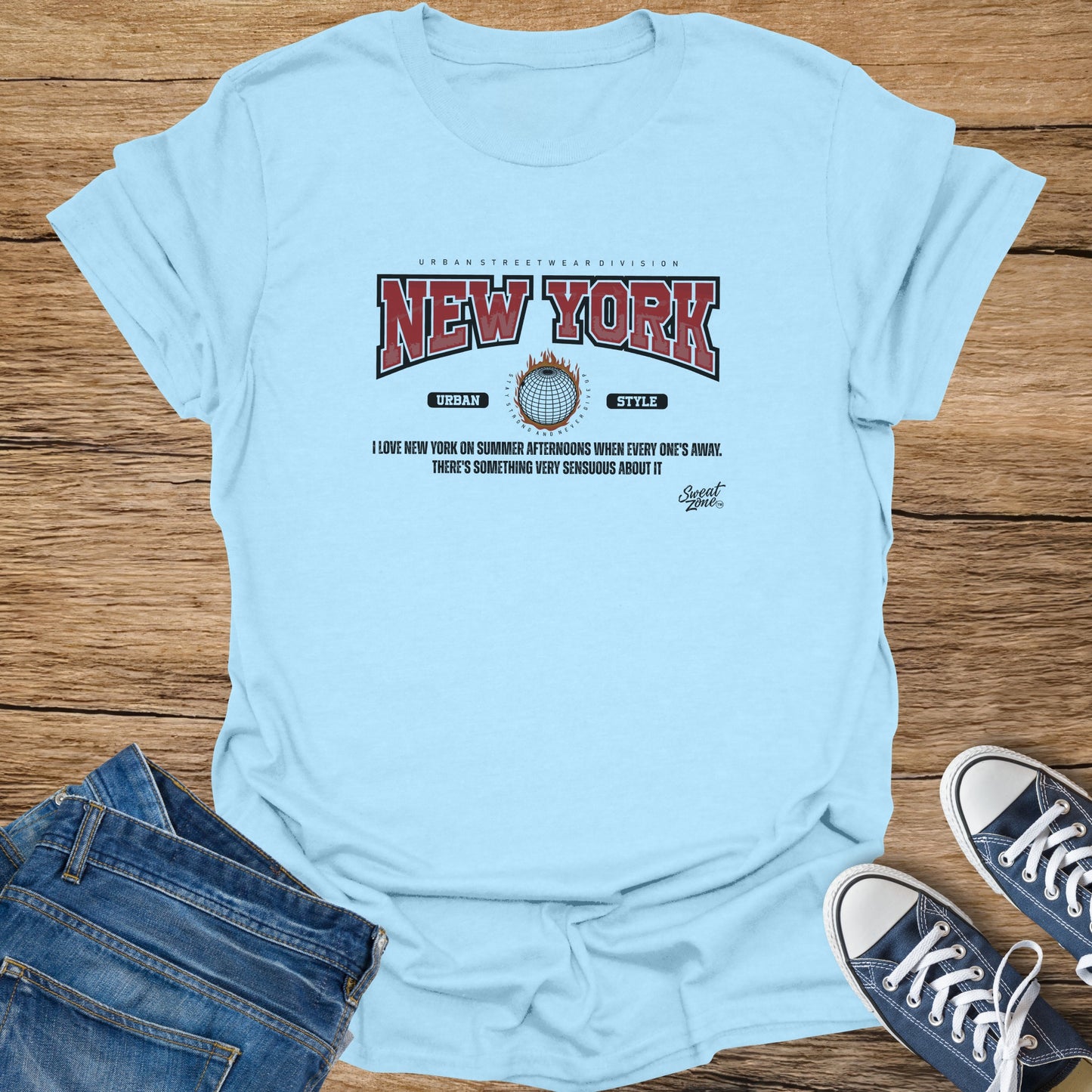 Light blue t-shirt with "New York" print and descriptive text.