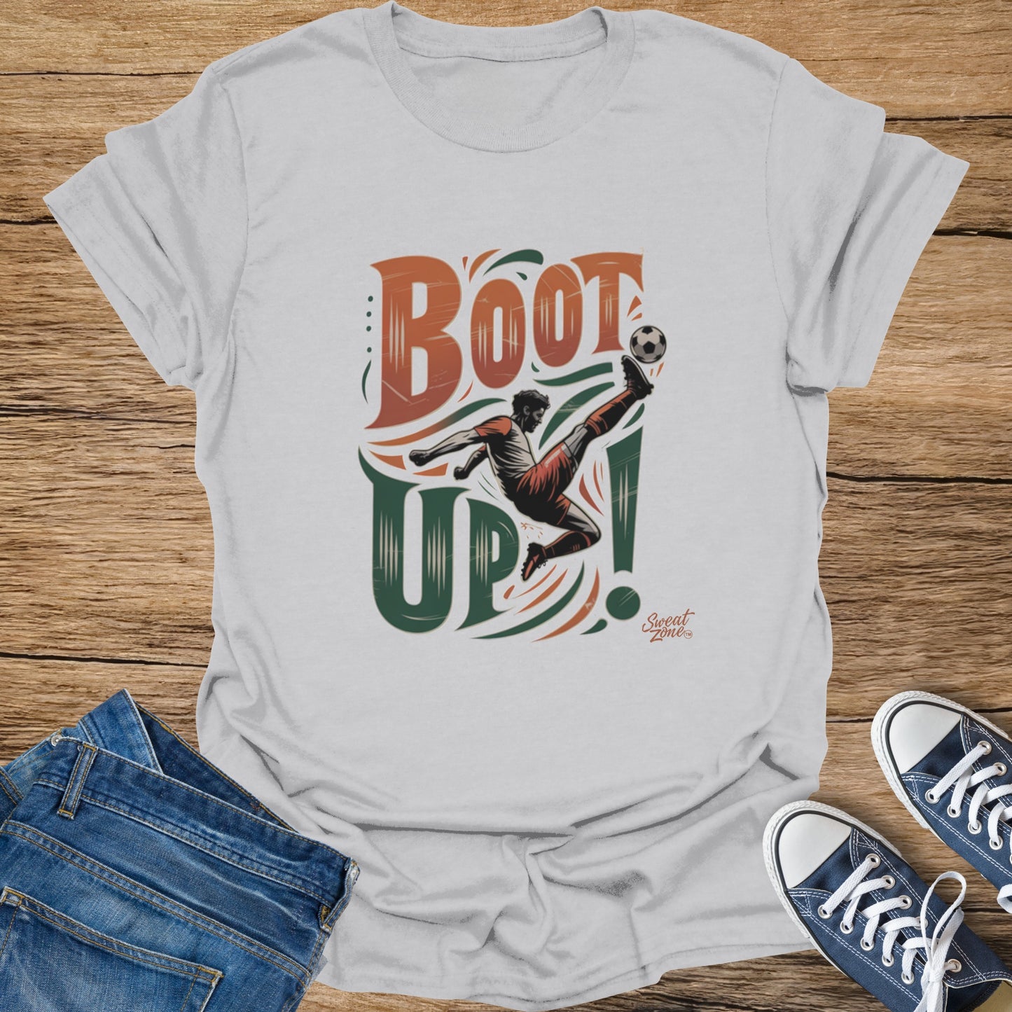 White t-shirt with "BOOT UP!" text and soccer player kicking ball graphic.