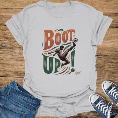 White t-shirt with "BOOT UP!" text and soccer player kicking ball graphic.