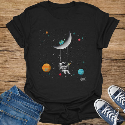 Astronaut swinging on the moon amidst planets and stars, with "Sweat Zone" text.