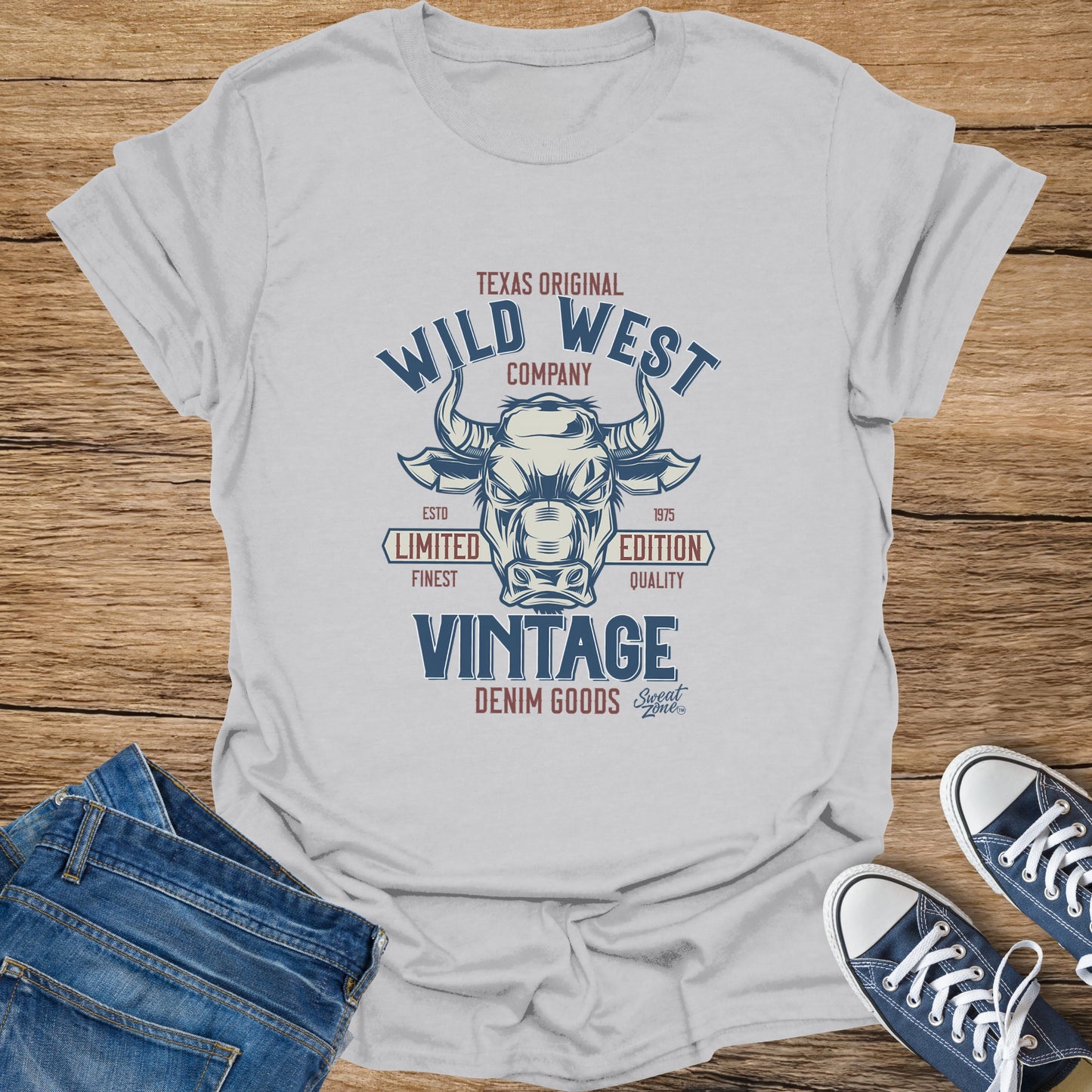 White t-shirt with "Wild West Company Vintage Denim Goods" text and bull graphic.