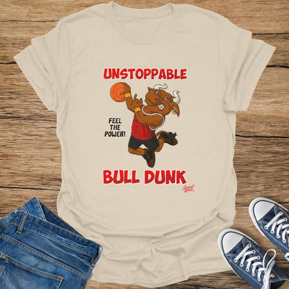 T-shirt with cartoon bull dunking basketball, text "Unstoppable" and "Bull Dunk".
