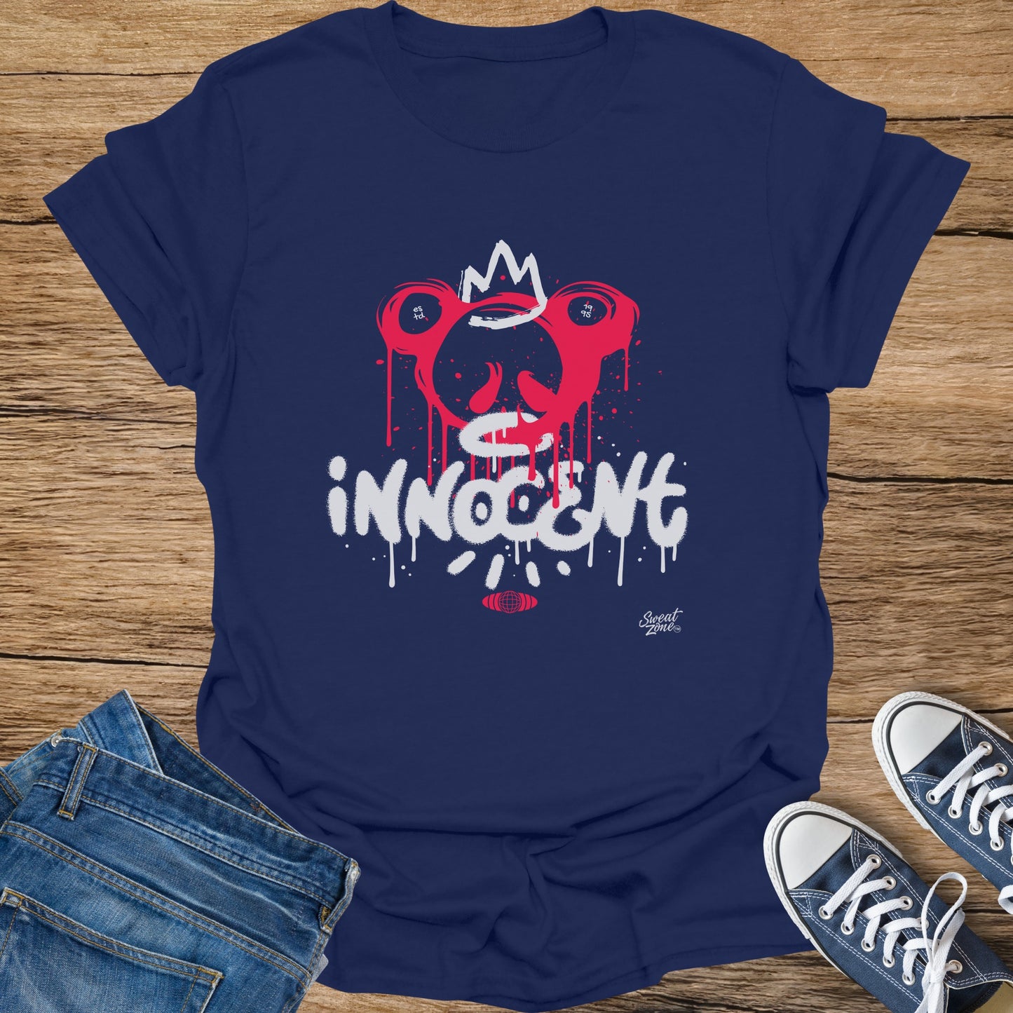 Navy t-shirt with dripping red face graphic and "innocent" text.