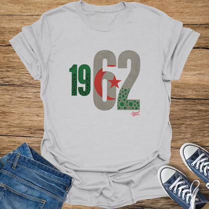 White t-shirt with "1962" and Algerian flag elements printed on it.