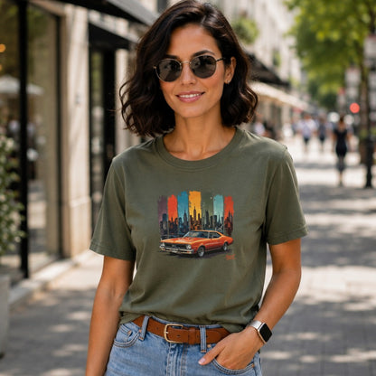 Olive t-shirt with graphic of an orange vintage car and city skyline.