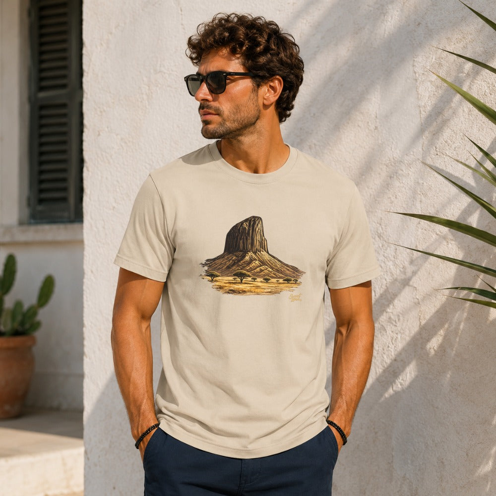 Beige t-shirt with a sketched desert rock formation and acacia trees design.