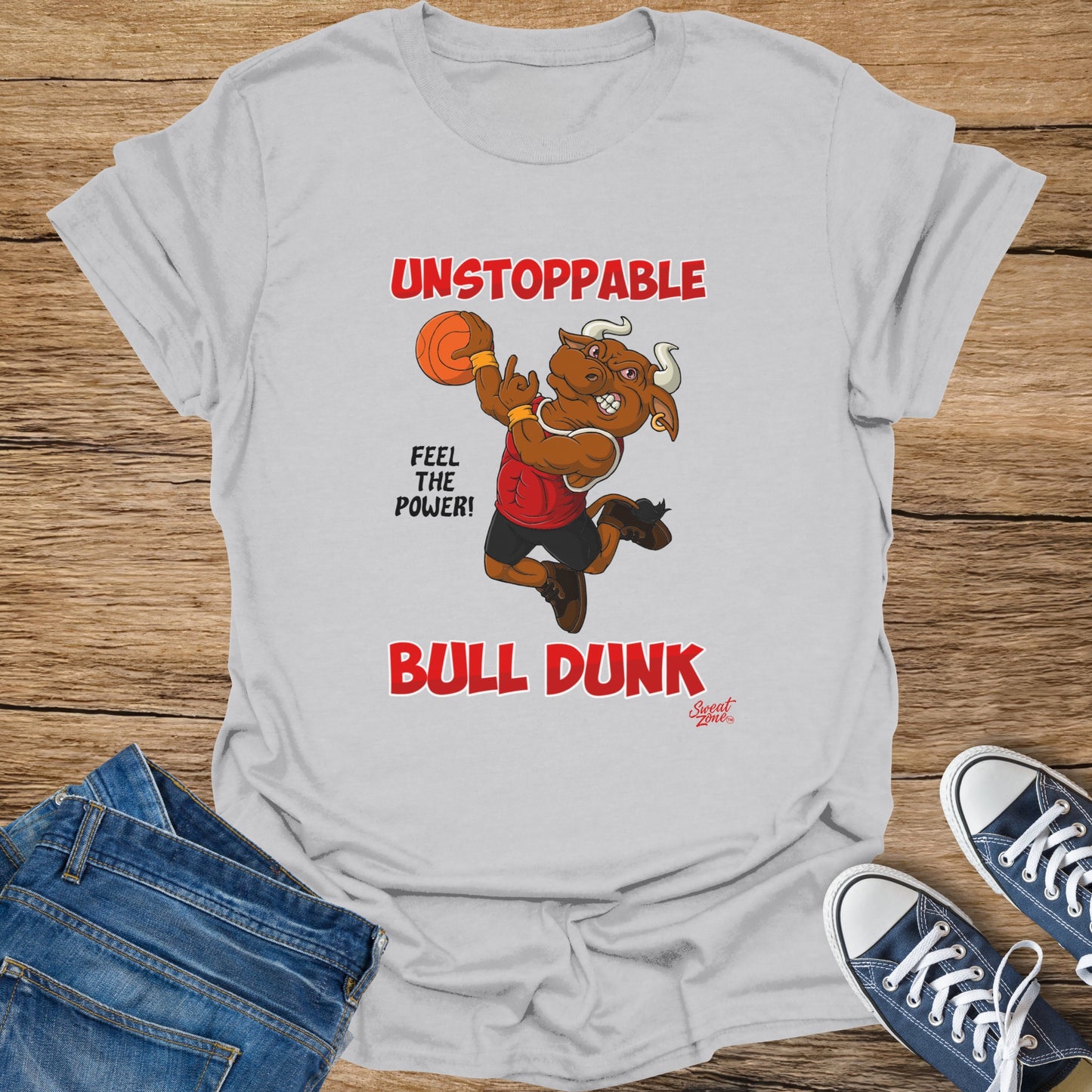Gray t-shirt with a bull basketball player graphic and text: Unstoppable, Feel The Power, Bull Dunk