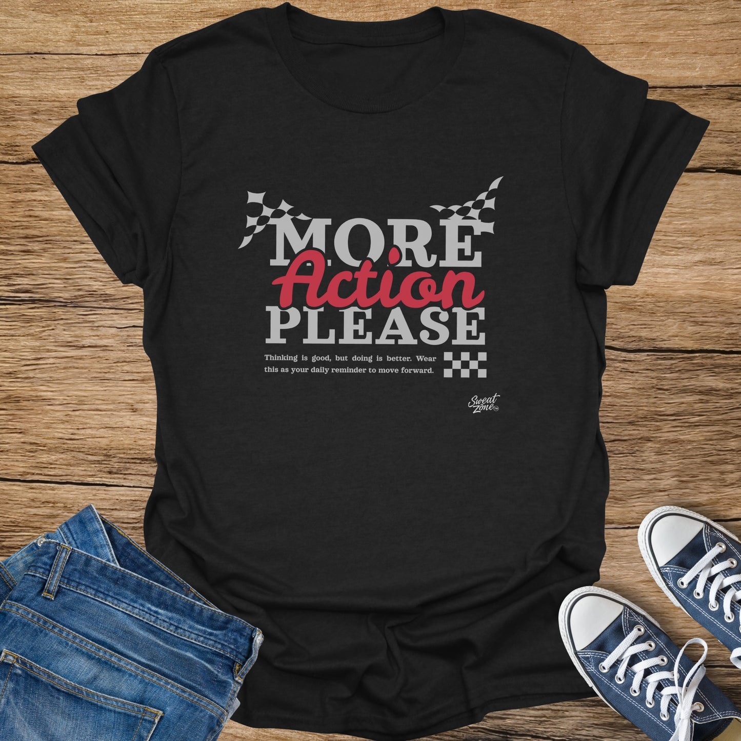 Black t-shirt with "More Action Please" text and checkered flags.