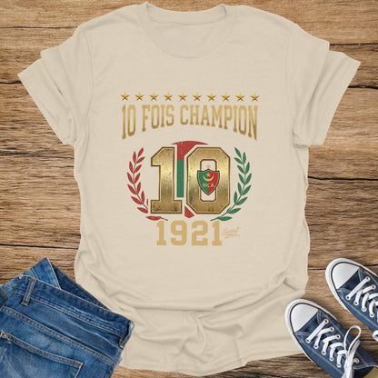 Cream t-shirt with "10 FOIS CHAMPION" text, a large "10", and "1921" graphic.