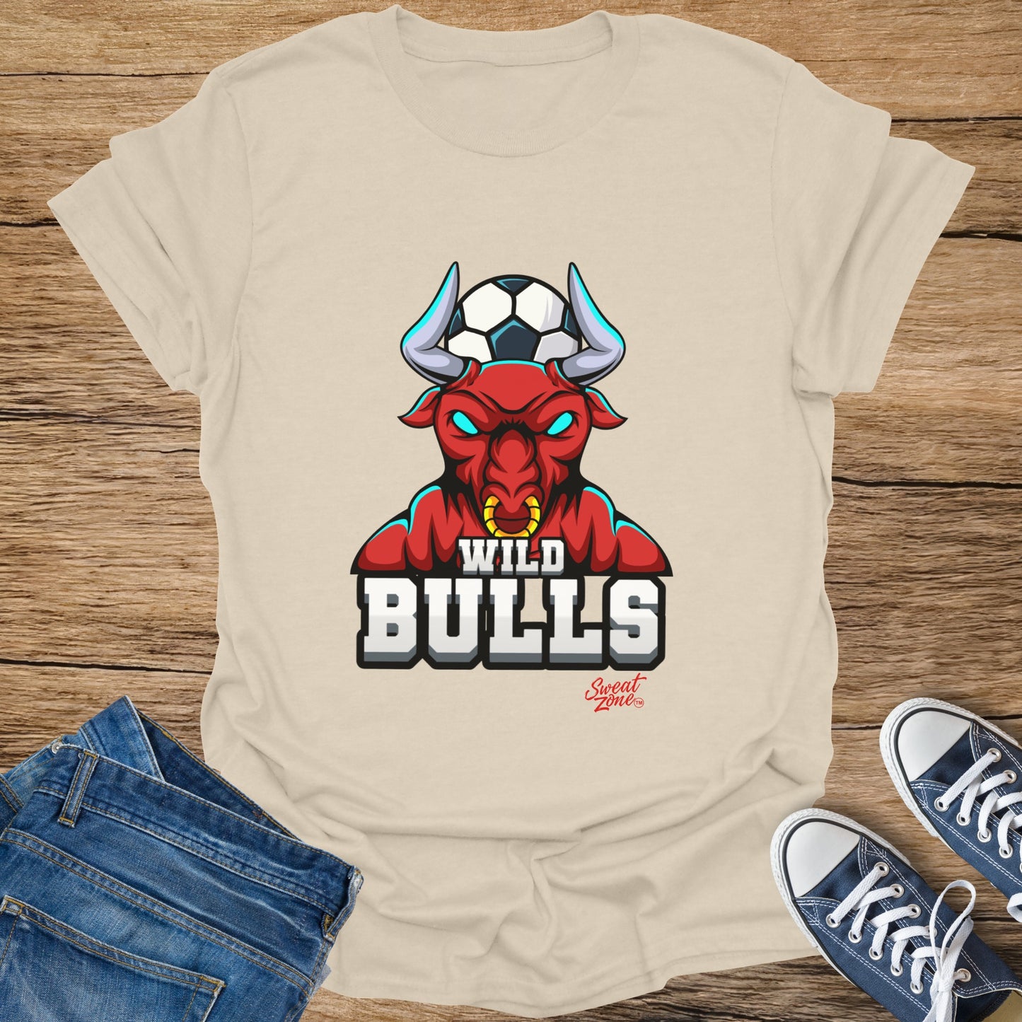 Beige t-shirt with red bull and soccer ball graphic, says "Wild Bulls".
