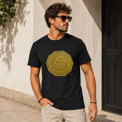 Black t-shirt on man with gold Arabic calligraphy emblem on chest.