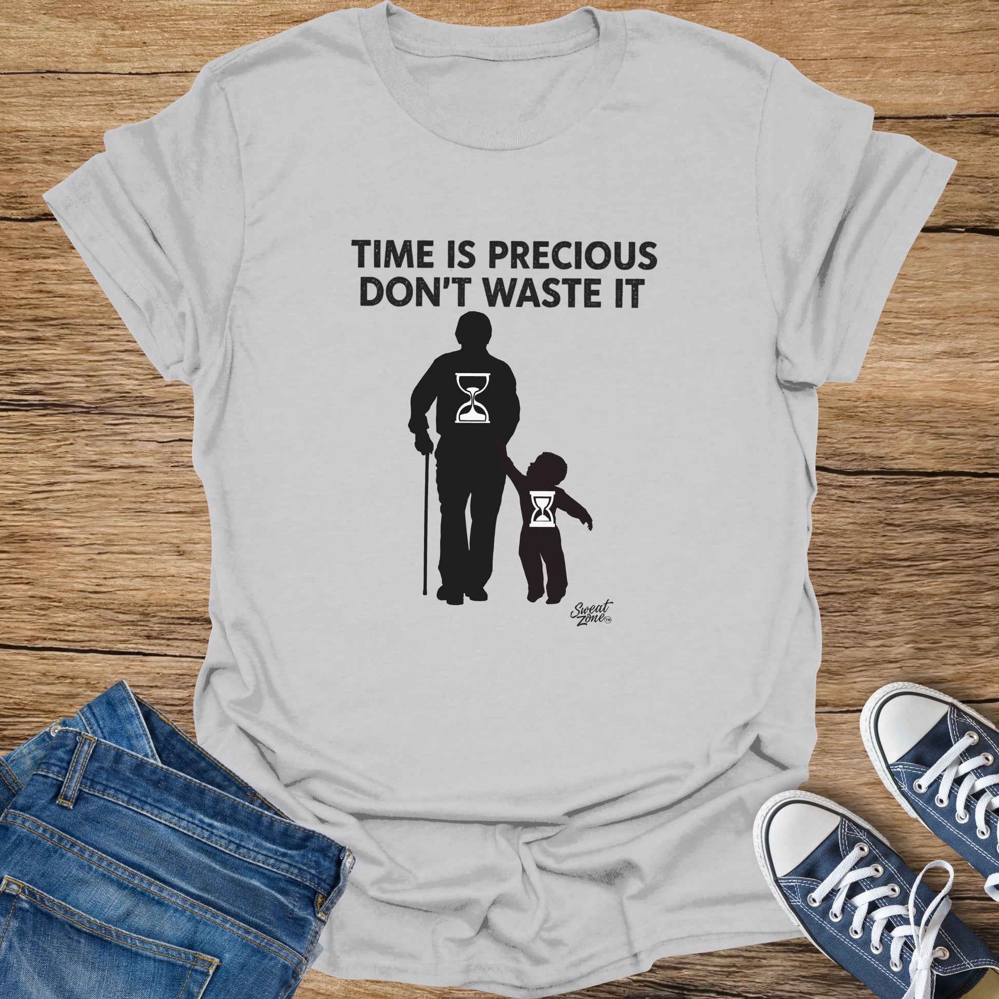 Grey t-shirt with silhouettes of an adult and child with hourglasses, text reads "TIME IS PRECIOUS DON'T WASTE IT".